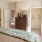 Bedroom with natural lighting and high ceilings